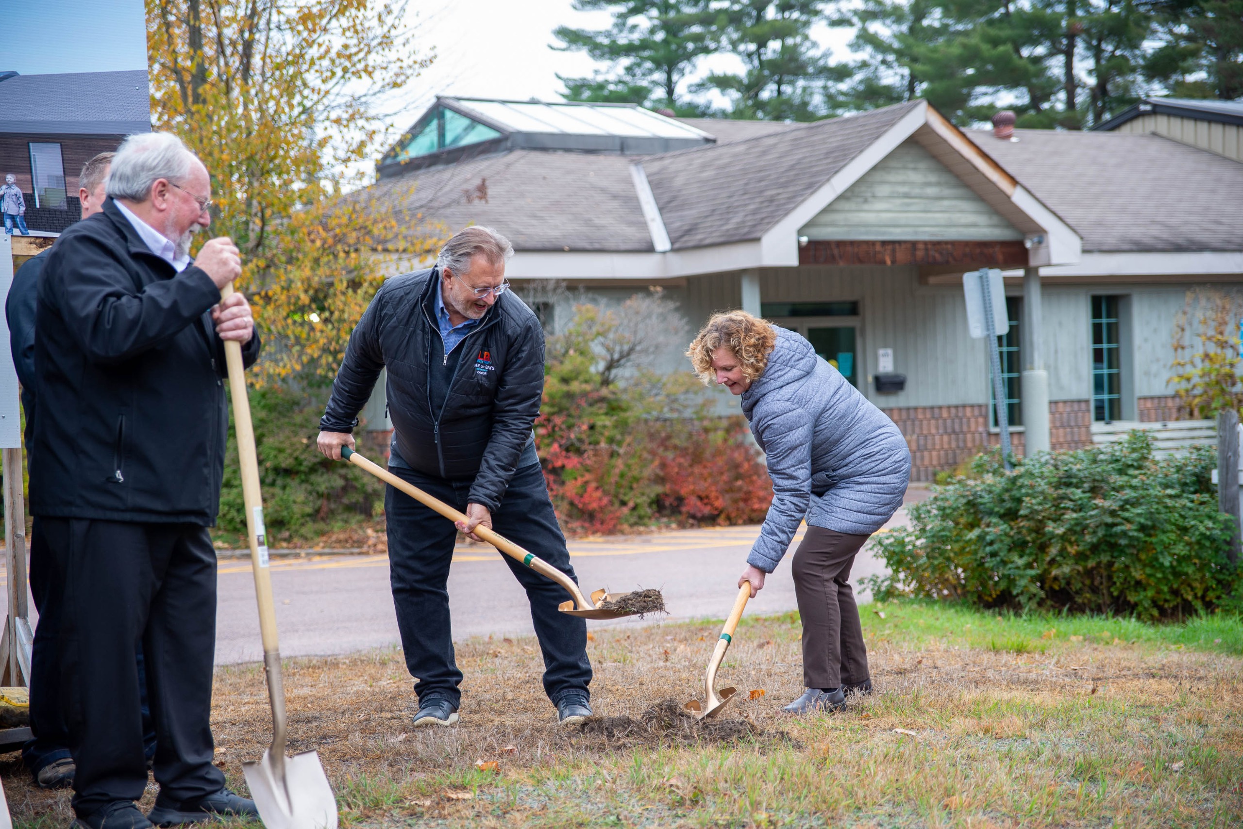 From right to left: Lake of Bays Library Board Chair Cathy Vanclieaf and Mayor Terry Glover turning sod...